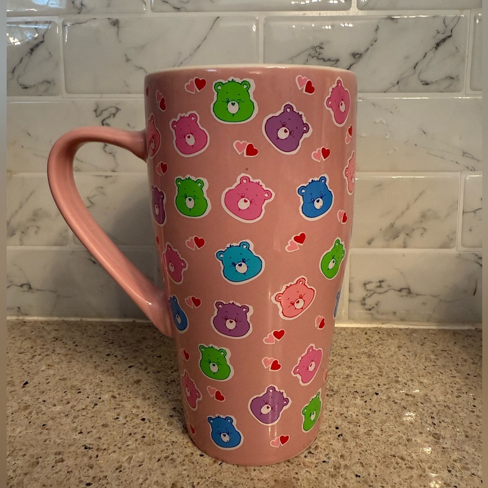 Pink Mug with Colorful Care Bear Design